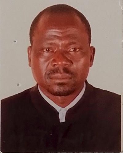 TOM OWILI